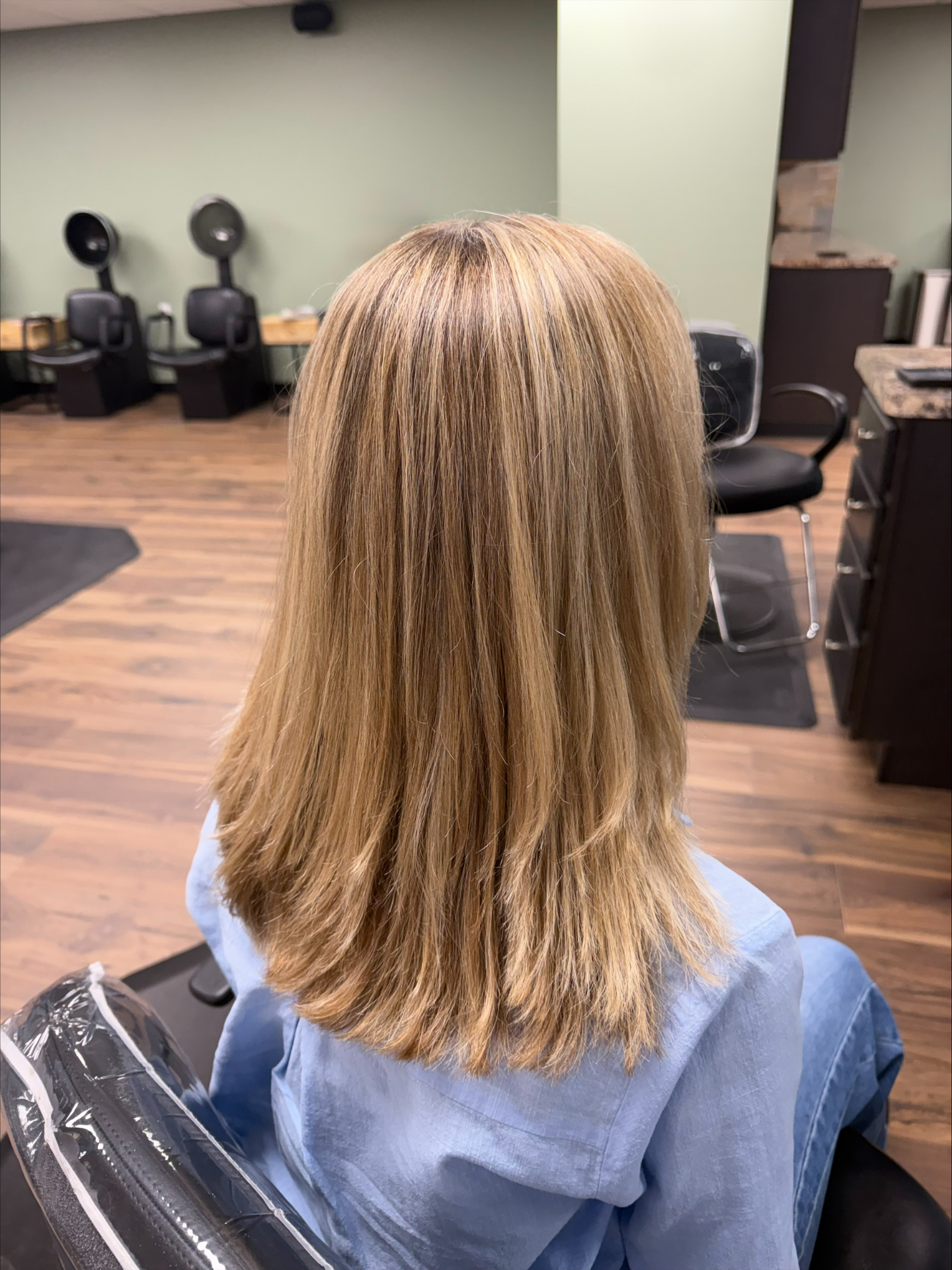 Layered blonde haircut at Favero's Hair Salon