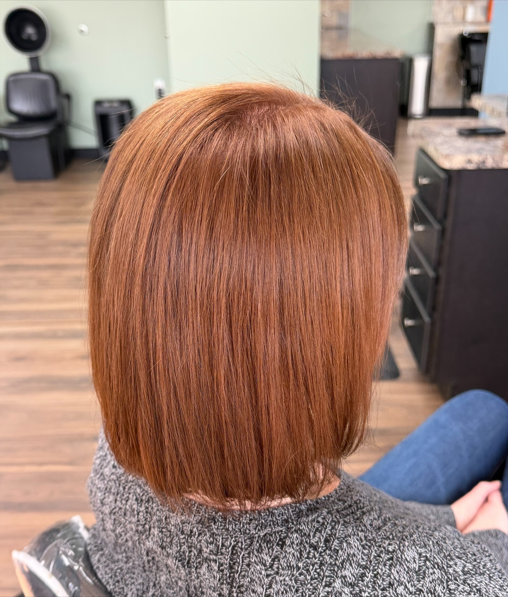 Short copper bob haircut at Favero's Hair Salon