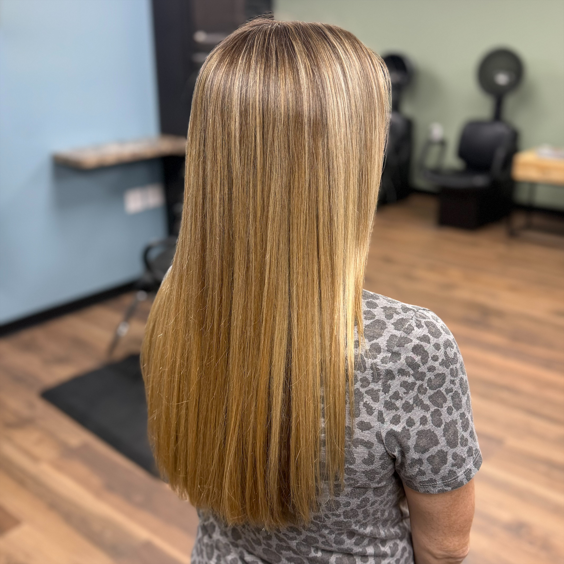 Long blonde highlighted hairstyle at Favero's Hair Salon