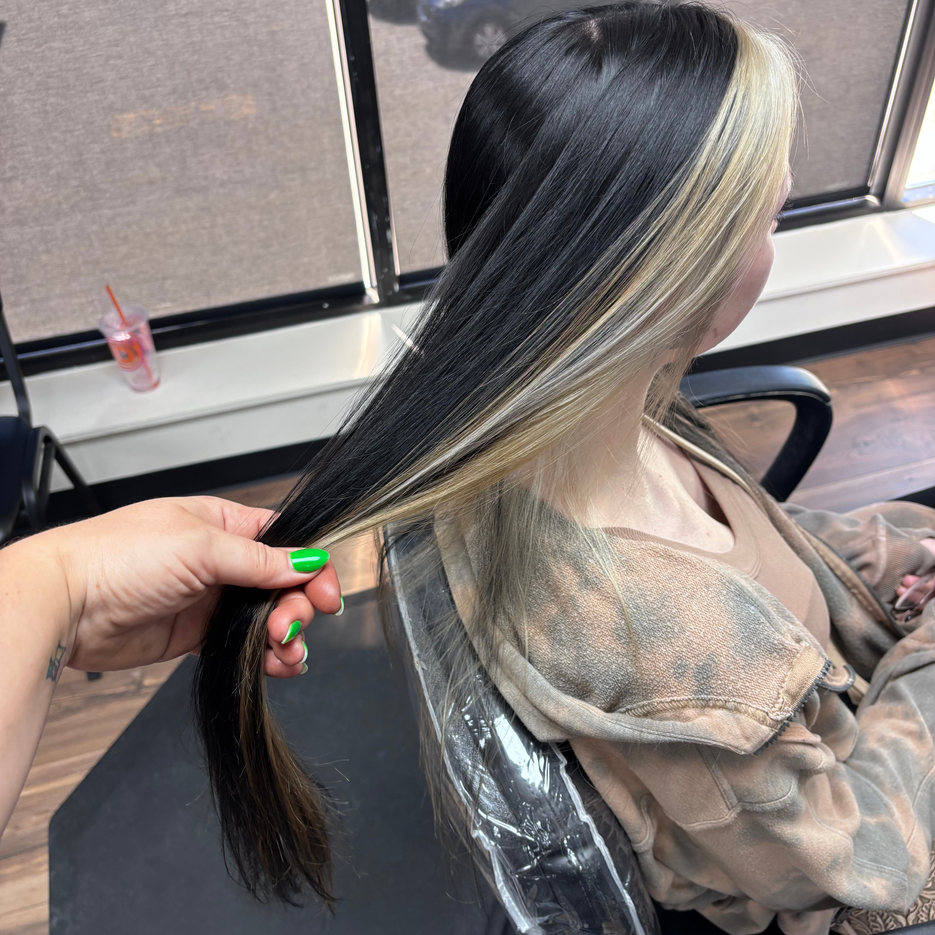 Black and blonde split color style at Favero's Hair Salon