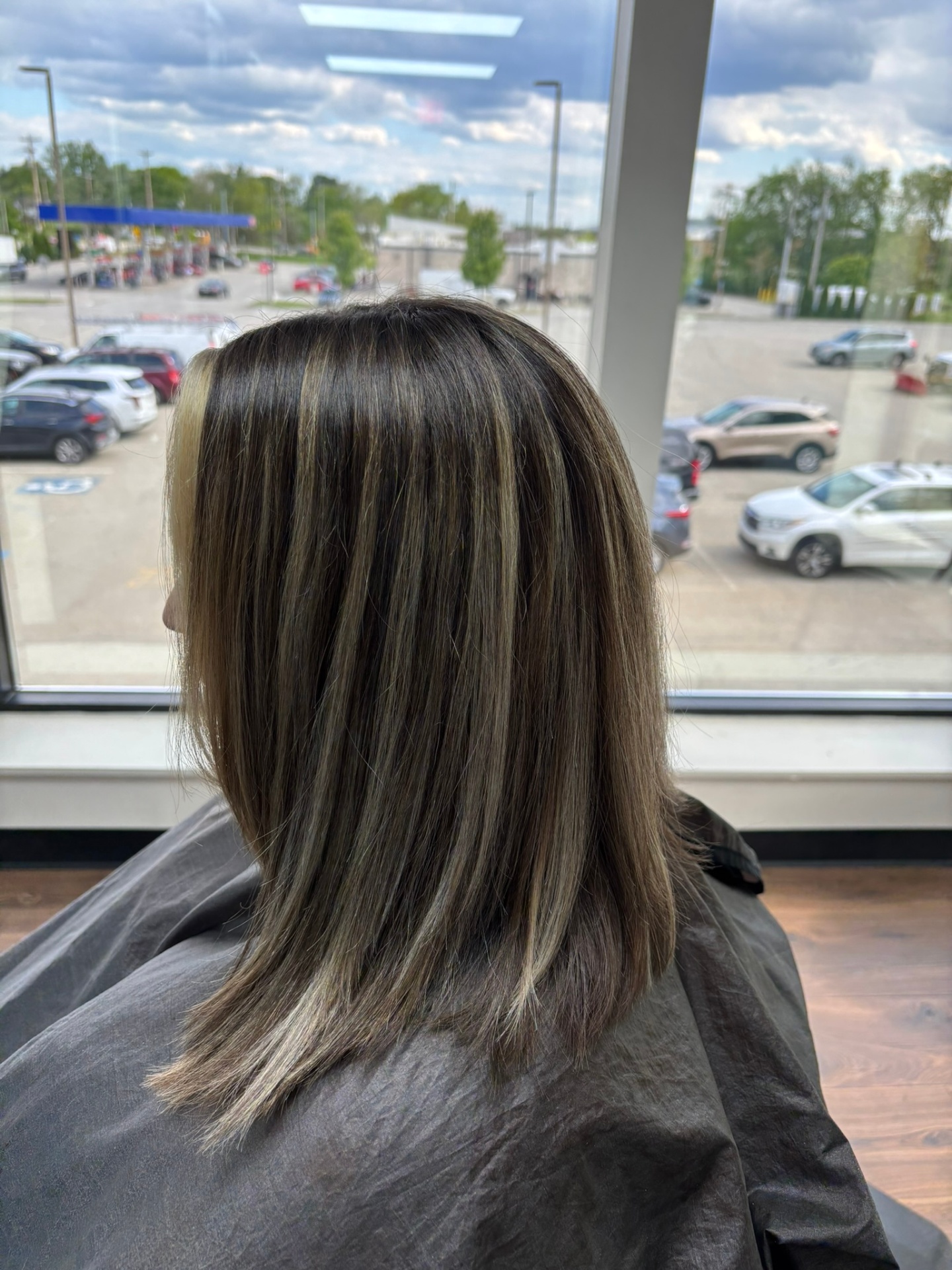 Dimensional brunette with blonde highlights at Favero's Hair Salon