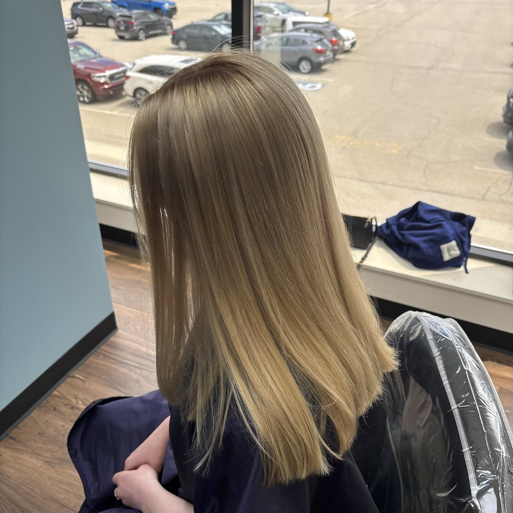 Smooth beige blonde balayage at Favero's Hair Salon