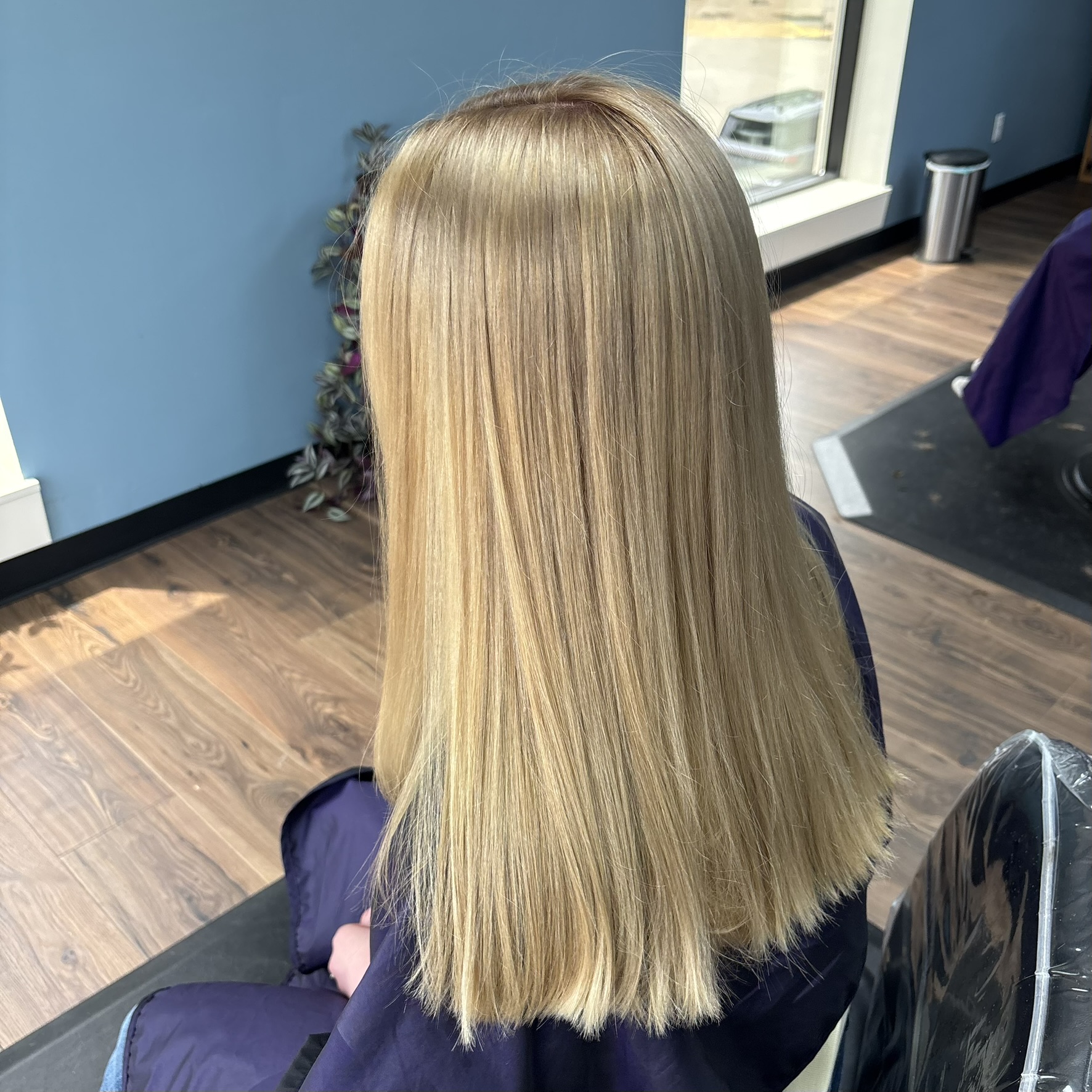 Bright straight blonde color at Favero's Hair Salon