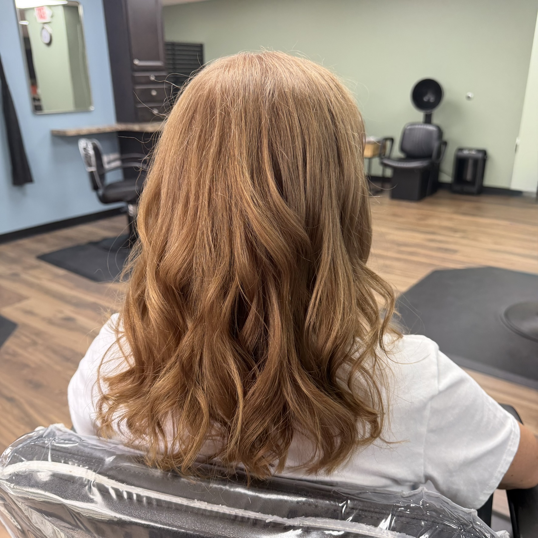 Soft copper waves at Favero's Hair Salon