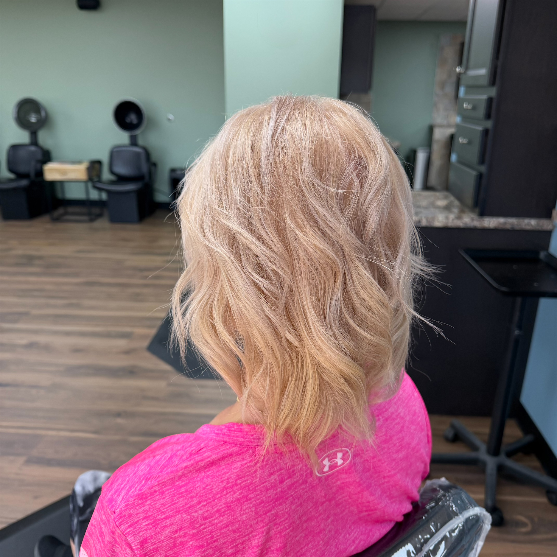 Soft blonde wavy style at Favero's Hair Salon