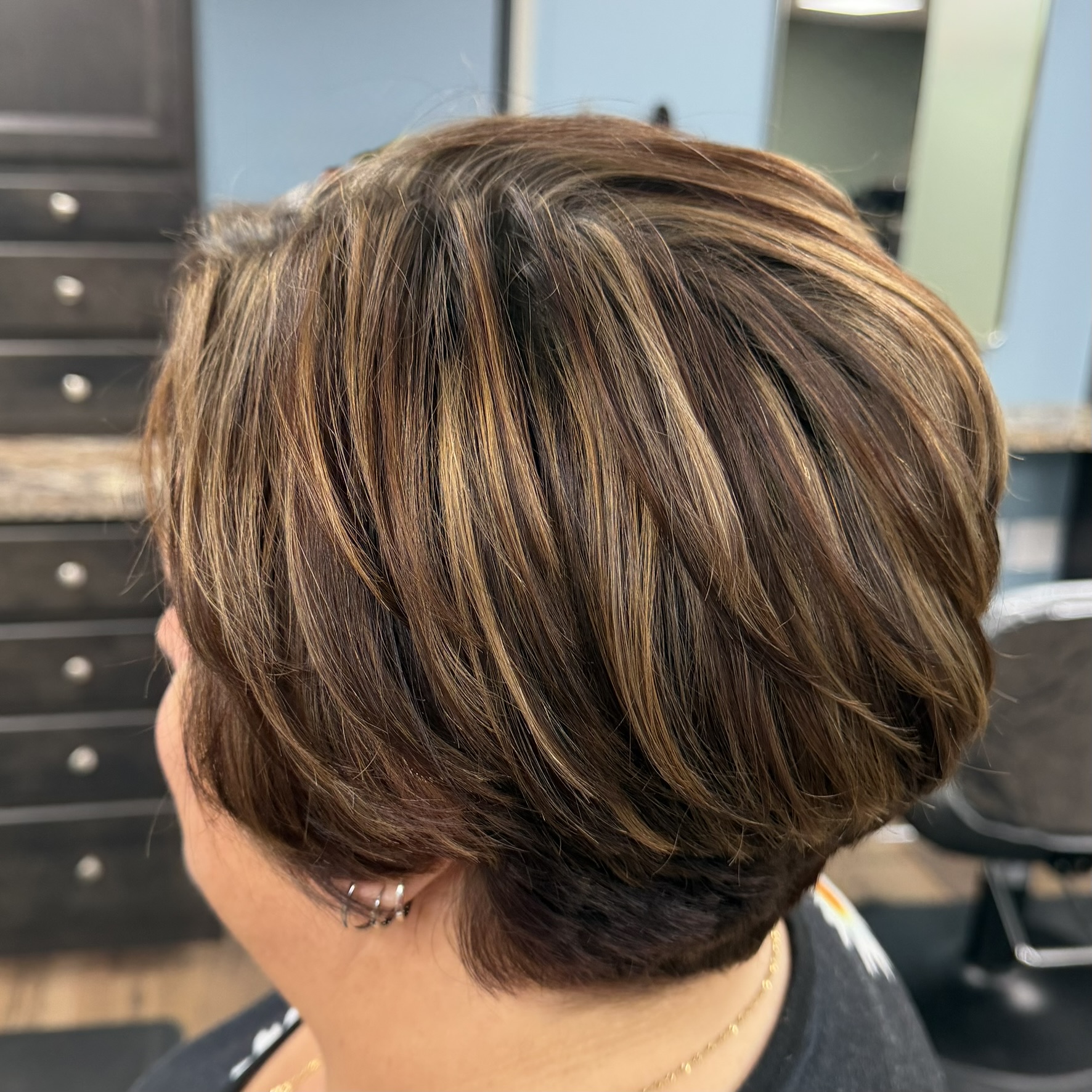 Stacked bob with caramel highlights at Favero's Hair Salon